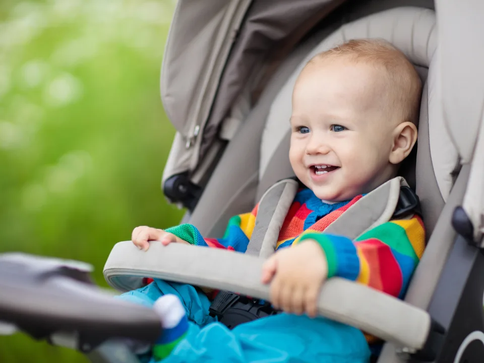 when can baby sit in stroller